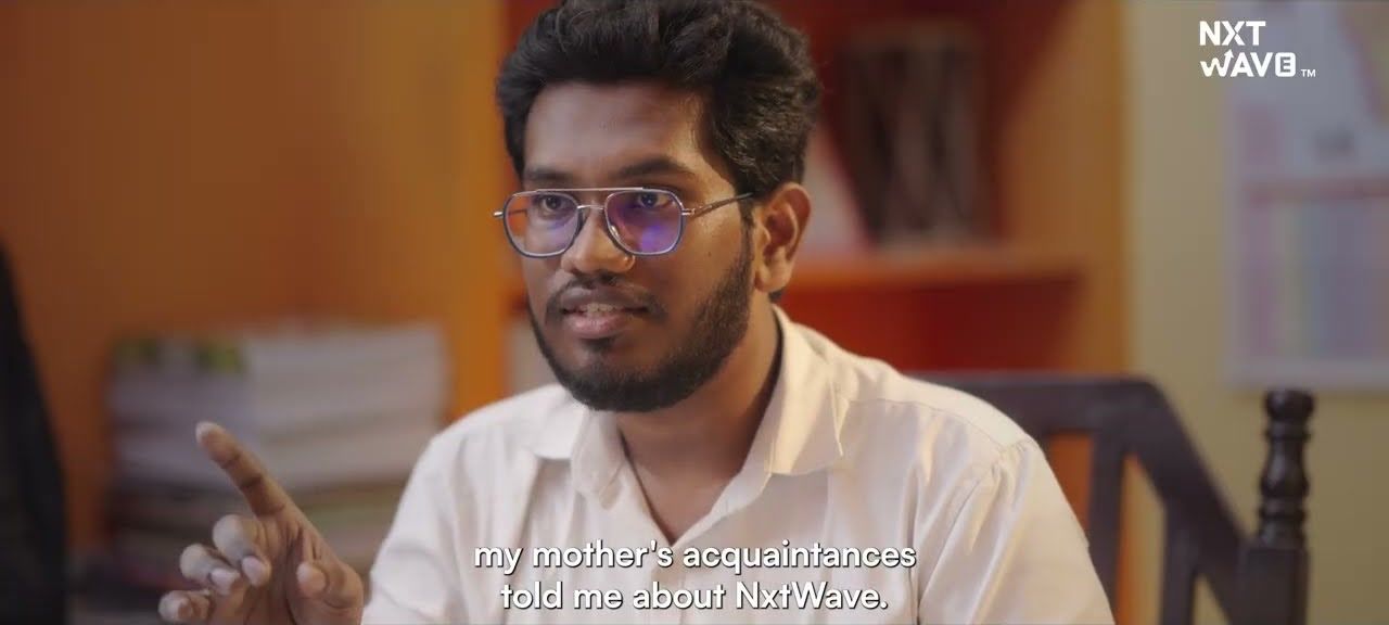 Sai Chandu smiling during an interview