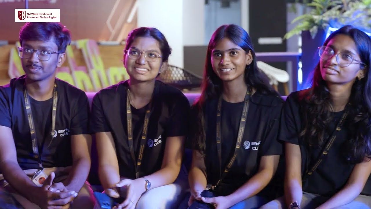 Students on stage under blue light at the NIAT hackathon