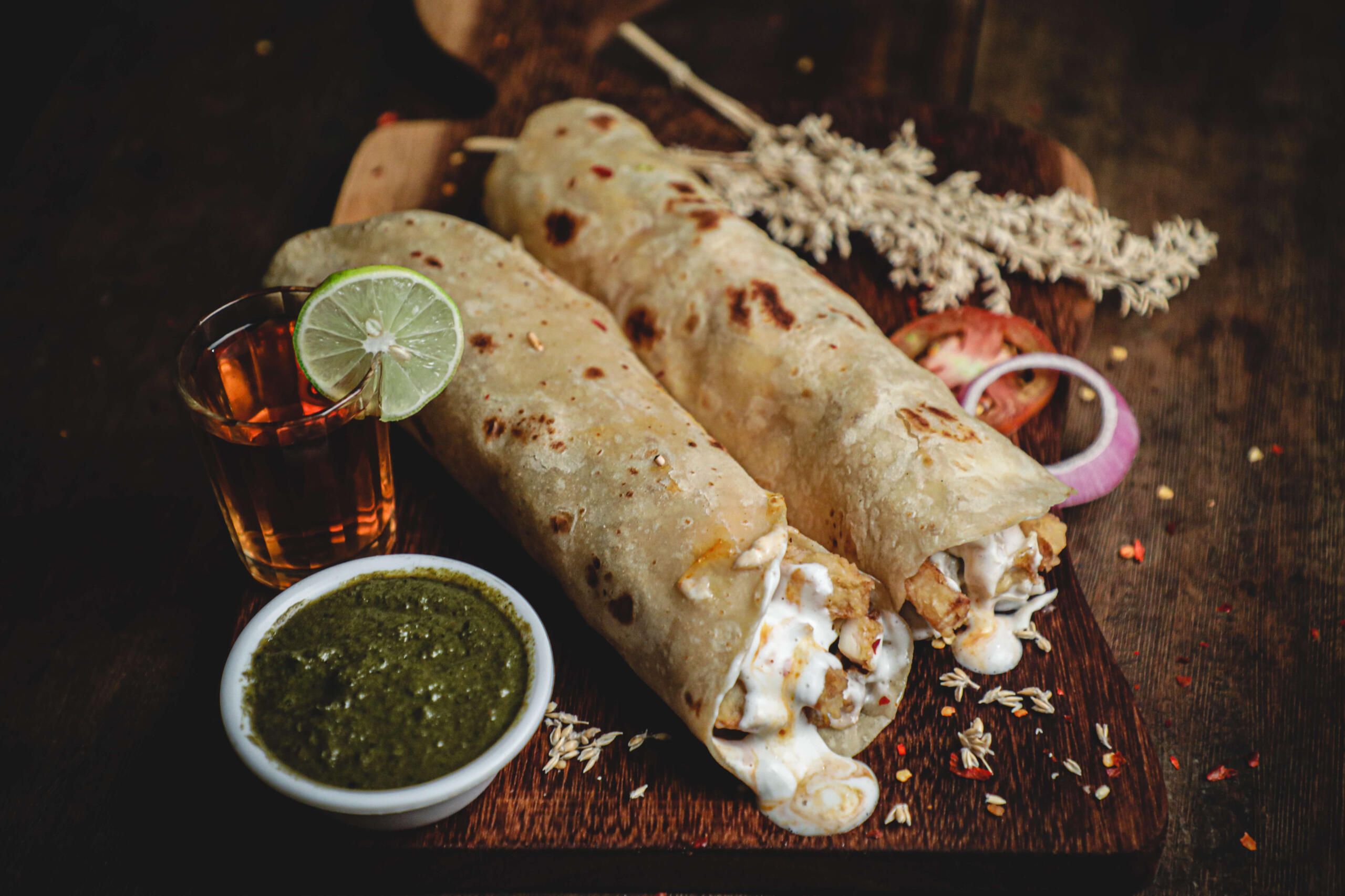 Kathi rolls styled on a dark board