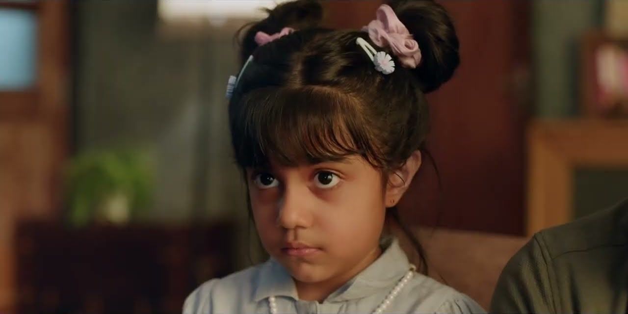 A young girl looking up