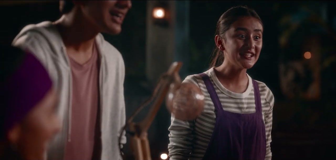 Two students in a warm room, from a Dell commercial